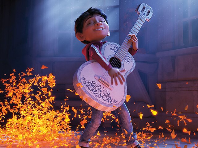 Miguel with Ernesto De La Cruz's guitar